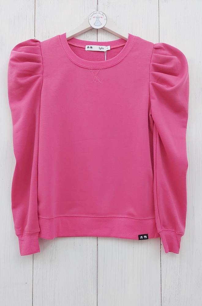 Camiseta rosa San Francisco de Lylu con mangas largas abullonadas. Cuello redondo con detalle decorativo. Una prenda básica con un toque de distinción.