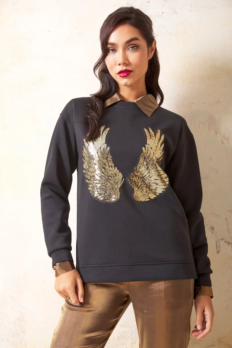 sudadera negra mujer Lylu Avila alas doradas