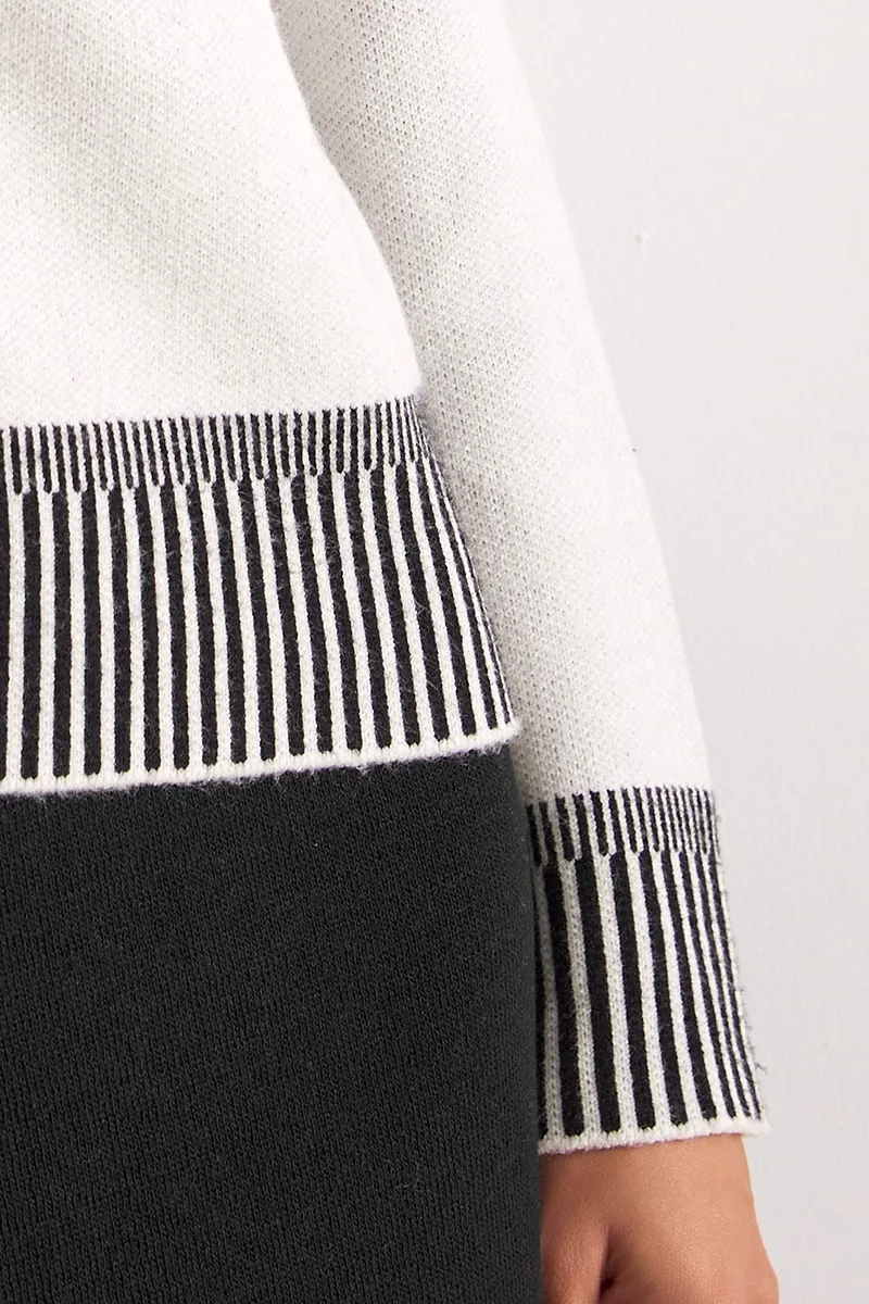 detalle manga puño canalé jersey blanco mujer Lylu Benavente