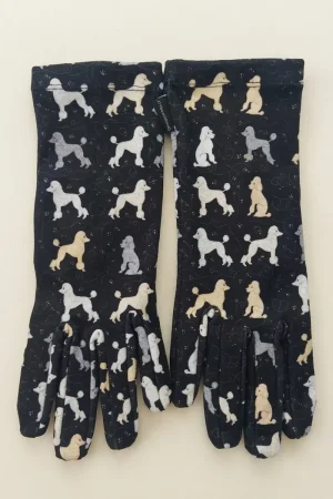 Guantes de mujer Cani Attaversiamo negros con estampado de caniches en gris y crema, vista frontal.